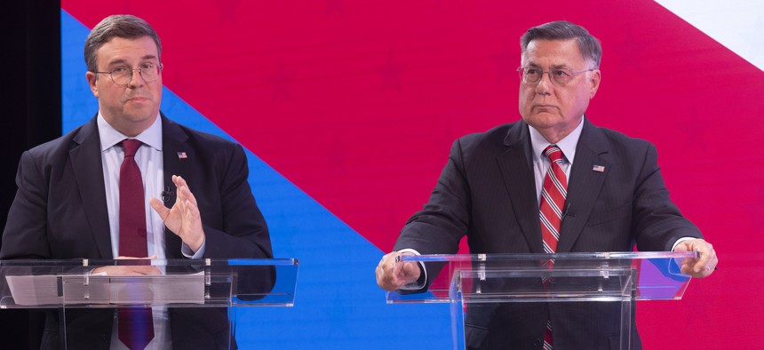Democrat David Calone and Republican Ed Romaine attend a Suffolk County executive debate at Newsday studios on Oct. 10, 2023.