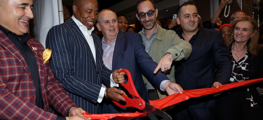 From left, Jack Sinanaj, New York City Mayor Eric Adams, Russ Sinanaj, Andrew Rigie, Jeff Sinanaj and Cristyne Nicholas attend the grand opening of the Empire Steak House on Oct. 25.