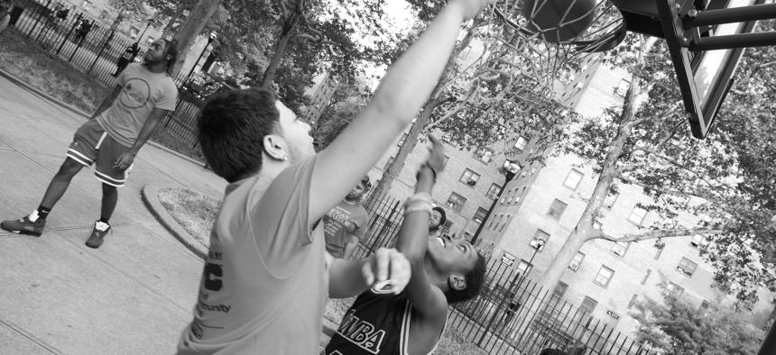 Shooting hoops at a SCAN-Harbor community center. 