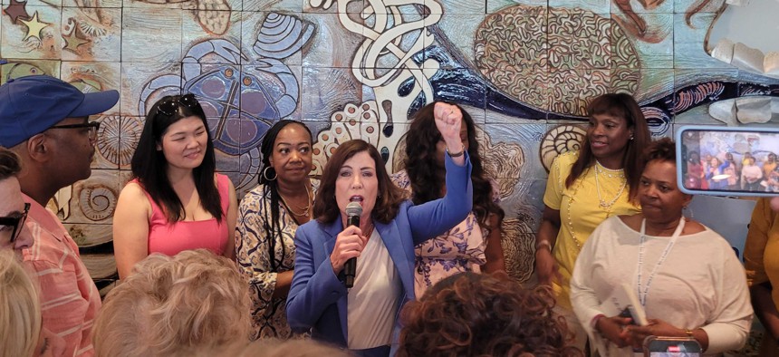 Gov. Kathy Hochul, center, addresses the Brooklyn Dems reception. 