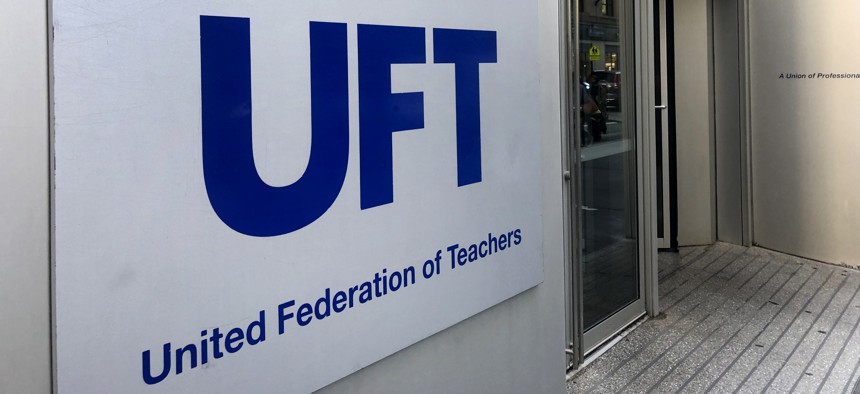 The teachers union is suing the mayor over budget cuts.