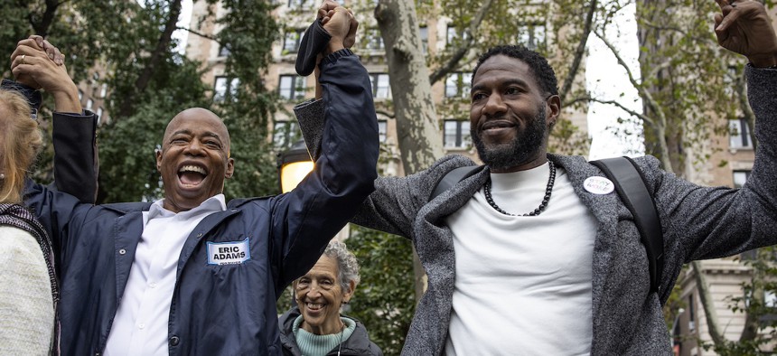 Eric Adams, left, and Jumaane Williams, right, in happier times.