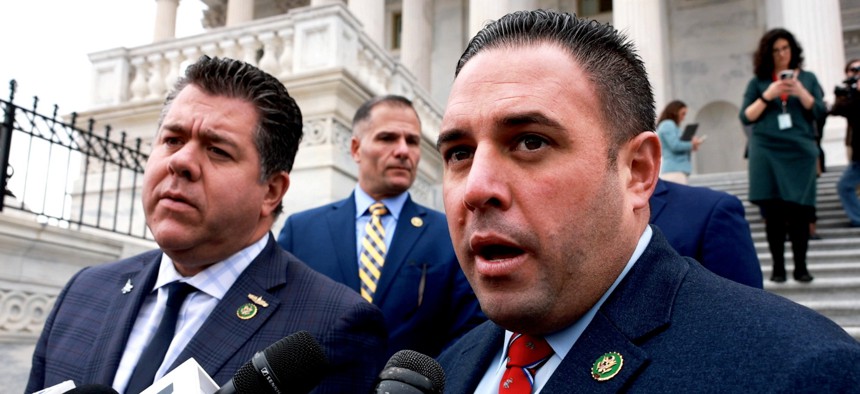 From left, Republican Reps. Nick LaLota, Marc Molinaro (background) and Anthony D’Esposito