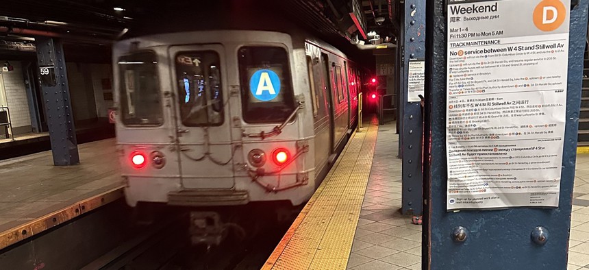 An A train leaves the Columbus Circle station.