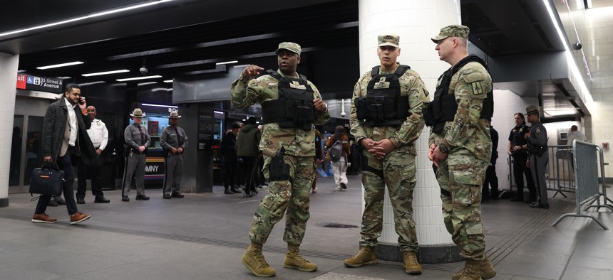National Guard troops are deployed at a subway station.