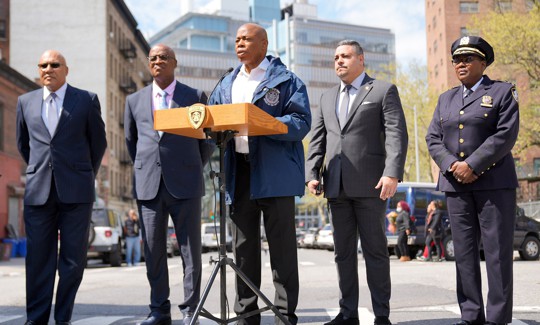 Mayor Adams (center) announced the restoration of two new classes of NYPD recruits on April 20, 2024.