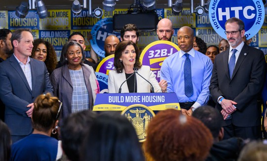 Gov. Kathy Hochul celebrated with hotel and building service workers, but no builders.