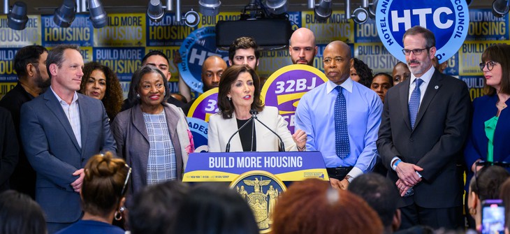 Gov. Kathy Hochul celebrated with hotel and building service workers, but no builders.