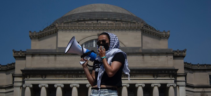A pro-Palestinian student protester speaks to a crowd at Columbia University on April 29, 2024.