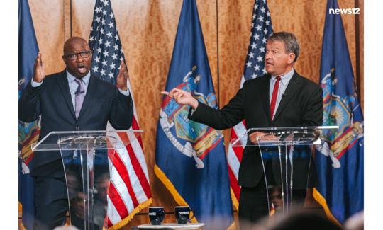 Rep. Jamaal Bowman (left) and Westchester County Executive George Latimer participate in a congressional primary debate hosted by News 12 on May 13, 2024.