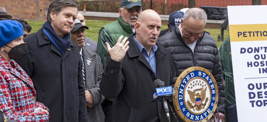 State Assembly Member Harvey Epstein speaks at a press conference outside the Veterans Administration Medical Center in Manhattan on March 27, 2022.
