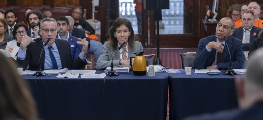 New York Public Library president Tony Marx (left), Brooklyn Public Library president Linda Johnson (center) and Queens Public Library president Dennis Walcott testify at a City Council budget hearing on May 21, 2024.