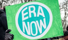A marcher holds an “ERA NOW” sign during the 2020 Women’s March in New York City.