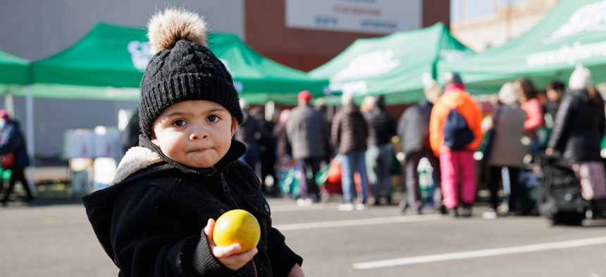 A child at the Sunset Park Mobile Market