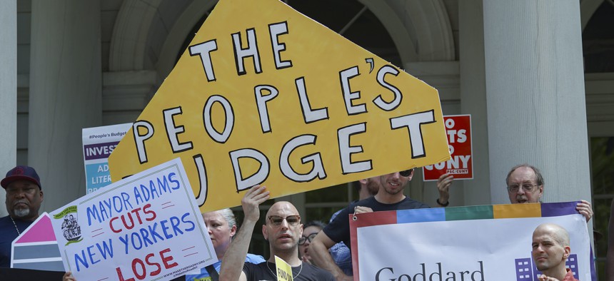 Demonstrators rally in favor of “The People’s Budget” outside City Hall on June 20, 2024.