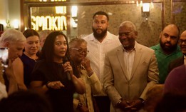 Cassandra Johnson (third from left) and Rep. Greg Meeks (second from right) speak at Johnson’s election night party on June 25, 2024.
