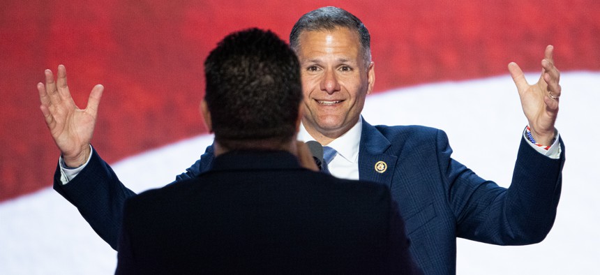 Rep. Marc Molinaro gets his picture taken at the Republican National Convention by Rep. Nick LaLota.