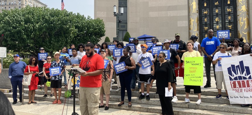 Elected officials and advocates rally against proposed revisions to the city outside of the Brooklyn Public Library on July 25, 2024.