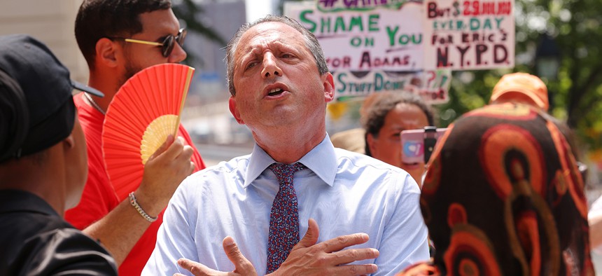 New York City Comptroller Brad Lander speaks during a rally against Mayor Eric 