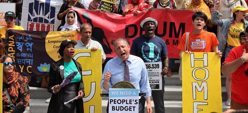 New York City Comptroller Brad Lander speaks at a rally against Mayor Eric Adams’ proposed budget cuts in June.