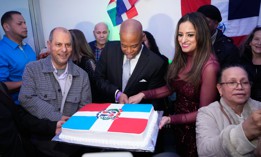 Assembly Member Jenifer Rajkumar joins Mayor Eric Adams at a Dominican Independence Day celebration in February.