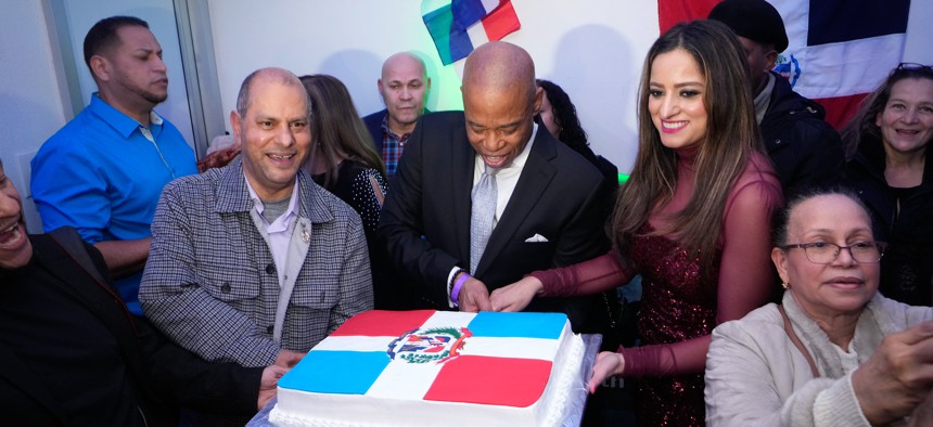 Assembly Member Jenifer Rajkumar joins Mayor Eric Adams at a Dominican Independence Day celebration in February.