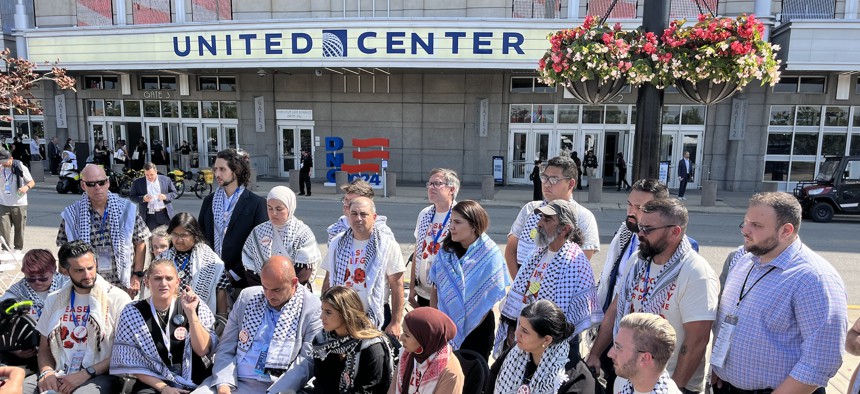 Uncommitted delegates hold a sit-in outside the United Center during the Democratic National Convention in Chicago on Aug. 22, 2024.