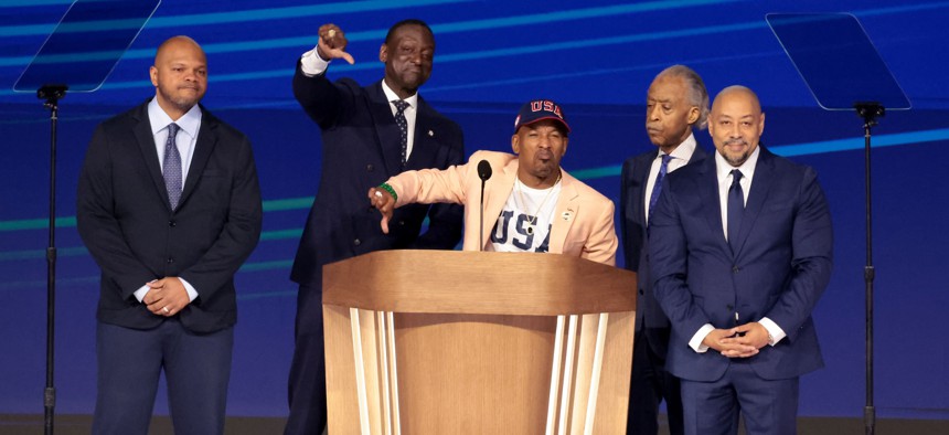 Rev. Al Sharpton (second from right) and members of the Exonerated Five speak during the Democratic National Convention in Chicago on Aug. 22, 2024. From left: Kevin Richardson, New York City Council Member Yusef Salaam, Korey Wise, Sharpton and Raymond Santana.