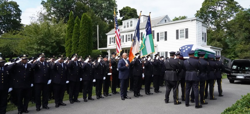 NYPD officers attend the funeral of police officer Gregory Purvis.