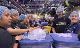 JPMorgan Chase employees volunteer at a day of service organized by the nonprofit 9/11 Day to remember the 23rd anniversary of the Sept. 11 terrorist attacks.