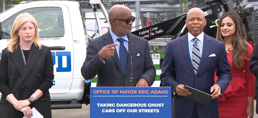 From left, Sanitation Commissioner Jessica Tisch, Deputy Mayor for Public Safety Phil Banks, New York City Mayor Eric Adams and Assembly Member Jenifer Rajkumar hold a press conference on “ghost cars.”