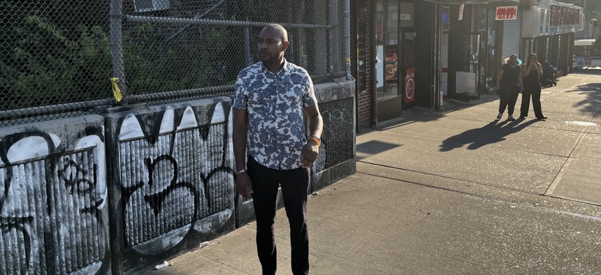 New York City Council Member Chris Banks looks toward the Sutter Avenue L stop Sunday.