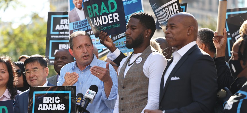 Brad Lander, Jumaane Williams and Eric Adams campaign together in 2021.