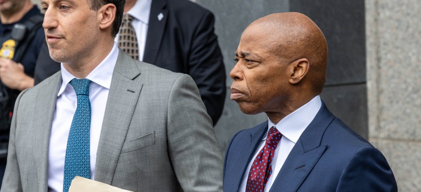 New York City Mayor Eric Adams leaves the federal courthouse in Manhattan after pleading not guilty to corruption charges.