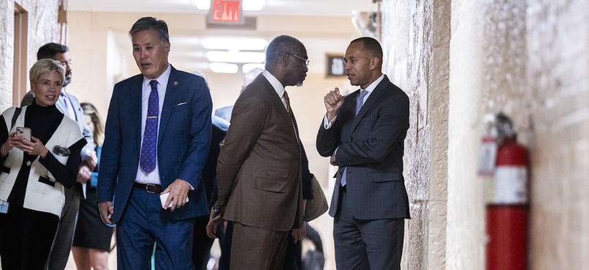 Reps. Greg Meeks and Hakeem Jeffries chat in the Capitol in 2022.