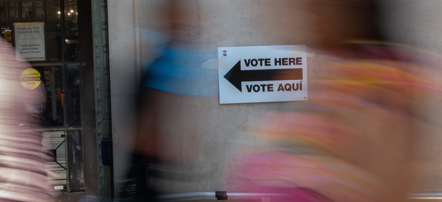 A sign directs people to the voting site at Bronx County Supreme Court during the Democratic primary on June 25, 2024.