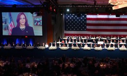 A video message from Vice President Kamala Harris plays during the annual Alfred E. Smith Foundation Memorial Dinner in Manhattan on Oct. 17, 2024.