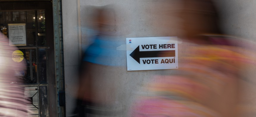 A sign directs people to the voting site at Bronx County Supreme Court during the Democratic primary on June 25, 2024 in New York City.