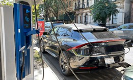 An electric vehicle charging station in New York City.