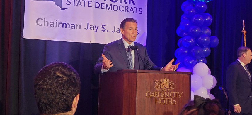 Rep. Tom Suozzi addresses supporters at an election night party.