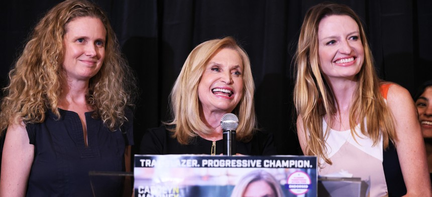 Virginia Maloney, right, with her sister Christina, left, and mother Carolyn.