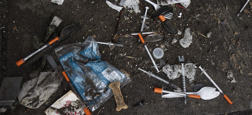 Used needles left behind after a sweep of a homeless encampment in New York City in 2022.