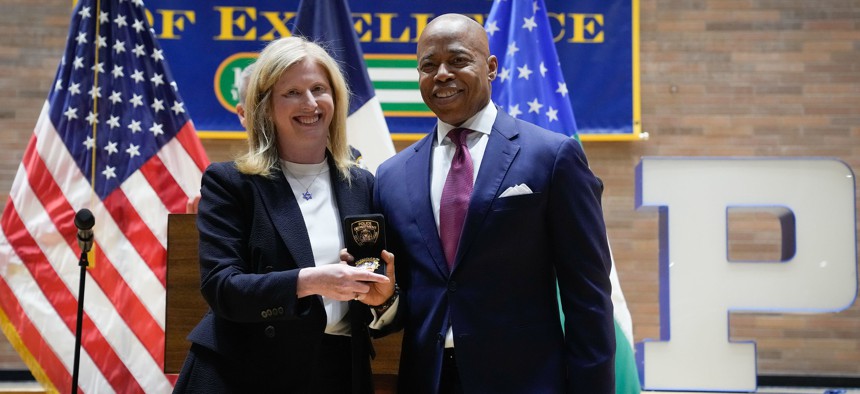 Mayor Eric Adams, left, picked Jessica Tisch, left, to lead the NYPD.