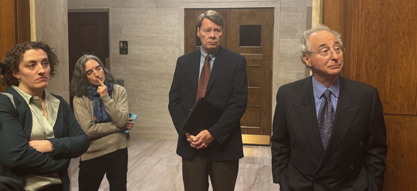 Rachael Fauss of Reinvent Albany, Maria Cilenti of the New York City Bar Association, Blair Horner of the New York Public Interest Research Group and Rich Schaffer of Citizens Union speak to reporters following oral argument at the Court of Appeals on Jan. 7, 2024.