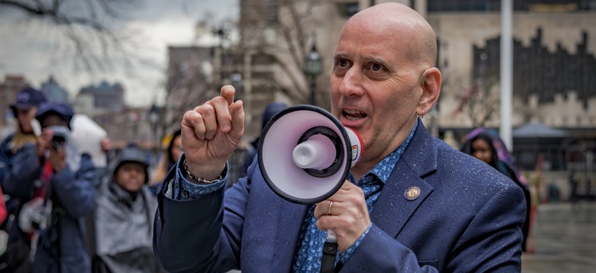 Assembly Member Harvey Epstein speaks at a rally outside City Hall on March 15, 2024. 