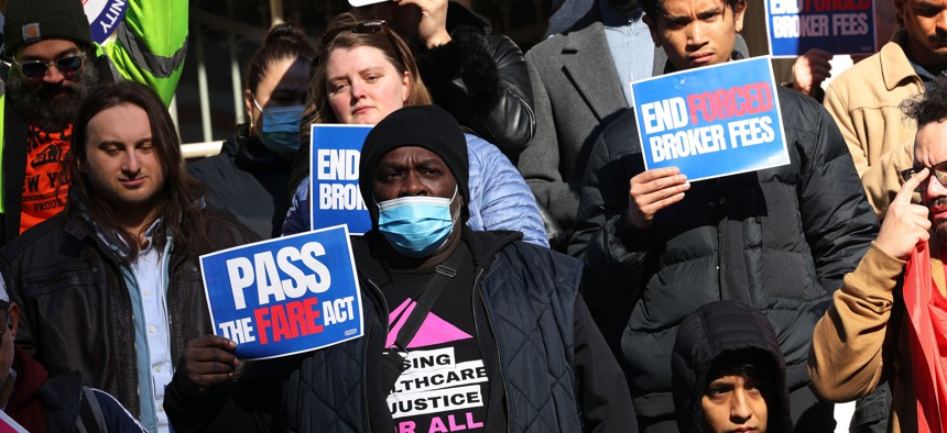 People gather outside City Hall to push for passage of a City Council bill freeing most New York City renters from having to pay broker fees. Assembly Member Chantel Jackson is sponsoring a similar bill in the Assembly that would apply statewide.