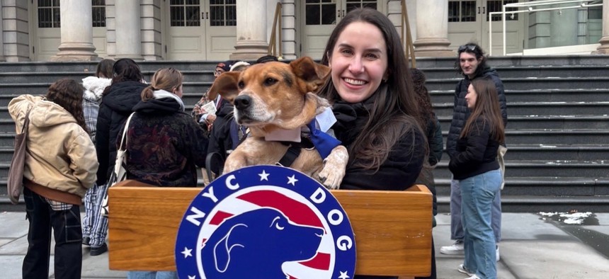 Simon, New York City’s second dog mayor, with his owner Sophie Vershbow at the inauguration ceremony at City Hall.