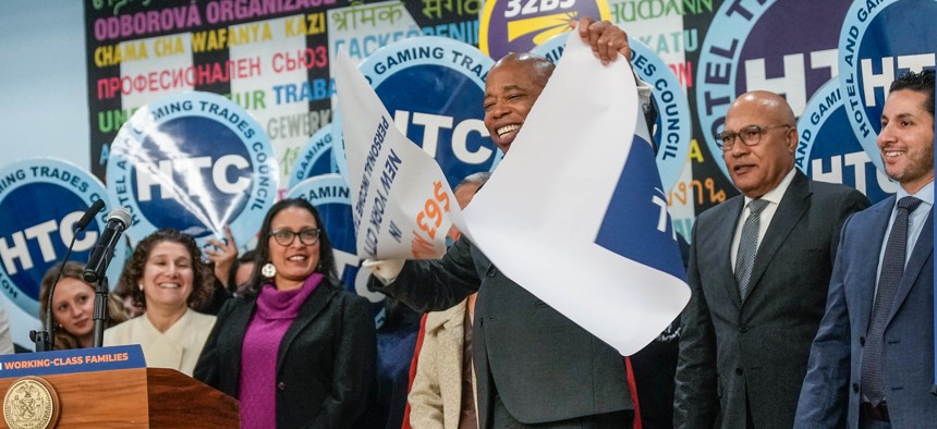 New York City Mayor Eric Adams announces his “Axe the Tax” proposal, which would eliminate city income taxes for low-income families, on Dec. 4, 2024.