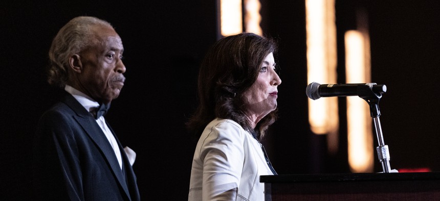 Gov. Kathy Hochul speaks at a National Action Network event with the Rev. Al Sharpton.