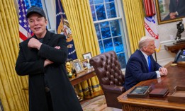 Billionaire Elon Musk, left, and President Donald Trump speak with reporters in the Oval Office on Feb. 11, 2025.